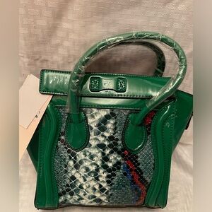 Green snake print mini handbag